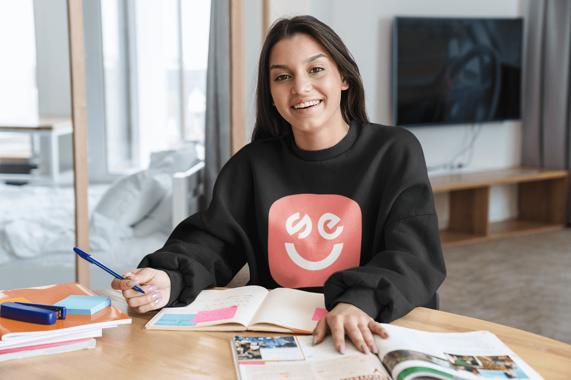 sweatshirt-mockup-featuring-a-young-happy-woman-studying-at-home-40484-r-el2